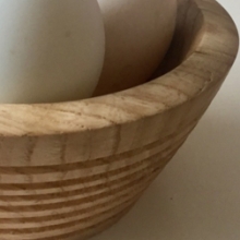 Hand turned wooden bowl with duck eggs
