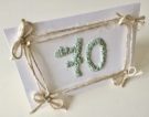 70th birthday card decorated with duck egg shells and twine