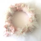 A wreath made from a vintage nightie embellished with tulle, pearls and wire