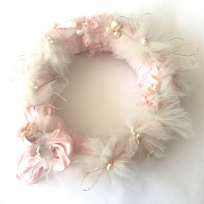 A wreath made from a vintage nightie embellished with tulle, pearls and wire