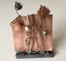 Art piece created from recycled copper, wire, nails and steel