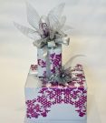 2 wrapped boxes with bows