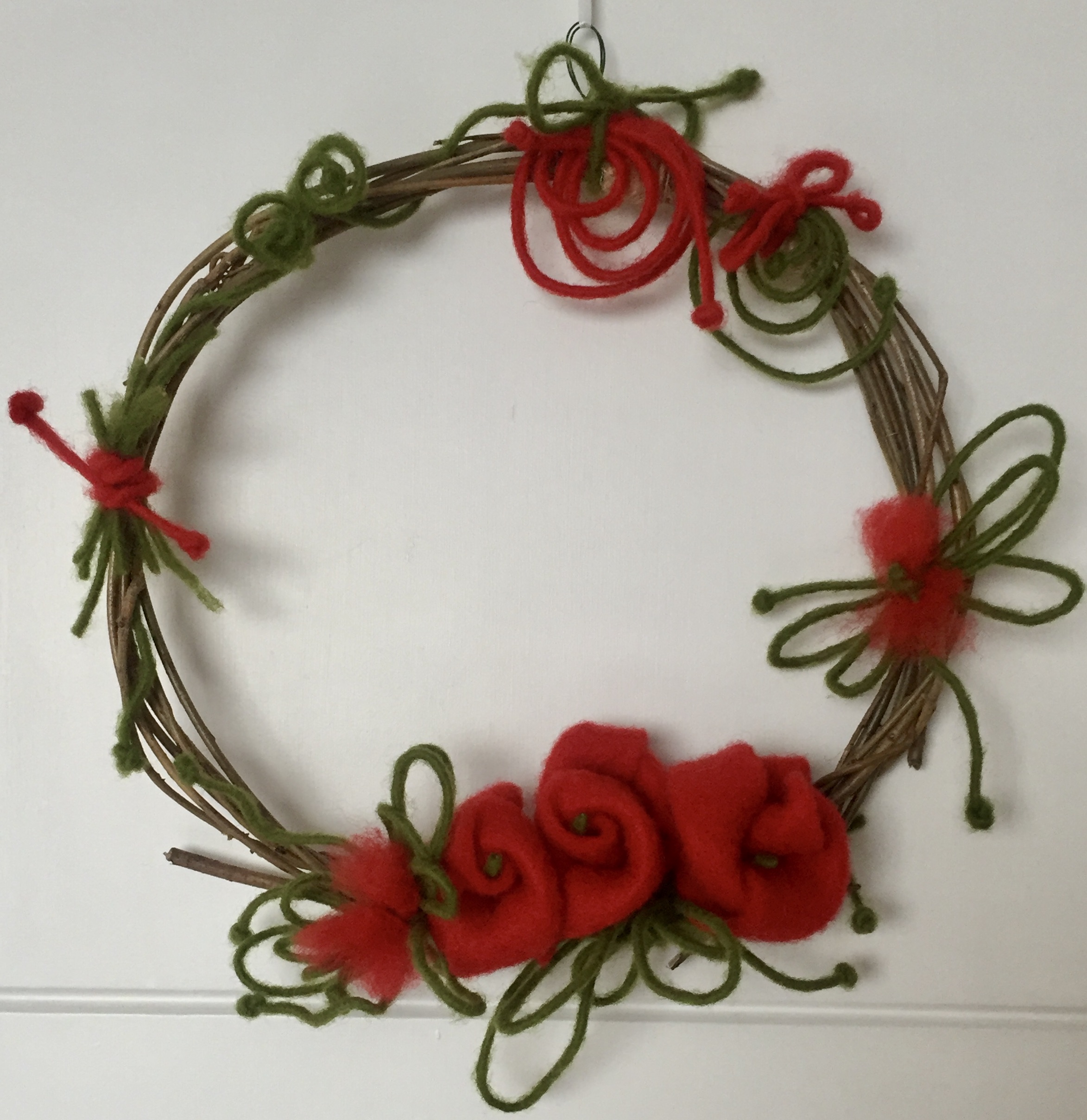 Handmade wreath with felt decoration